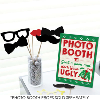 Ugly Sweater Photo Booth Sign - Holiday and Christmas Party Decorations - Printed on Sturdy Plastic Material - 10.5 x 13.75 inches - Sign with Stand - 1 Piece