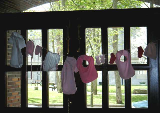 Baby Shower Game Idea: Decorate Onesies for the Mommy-To-Be!