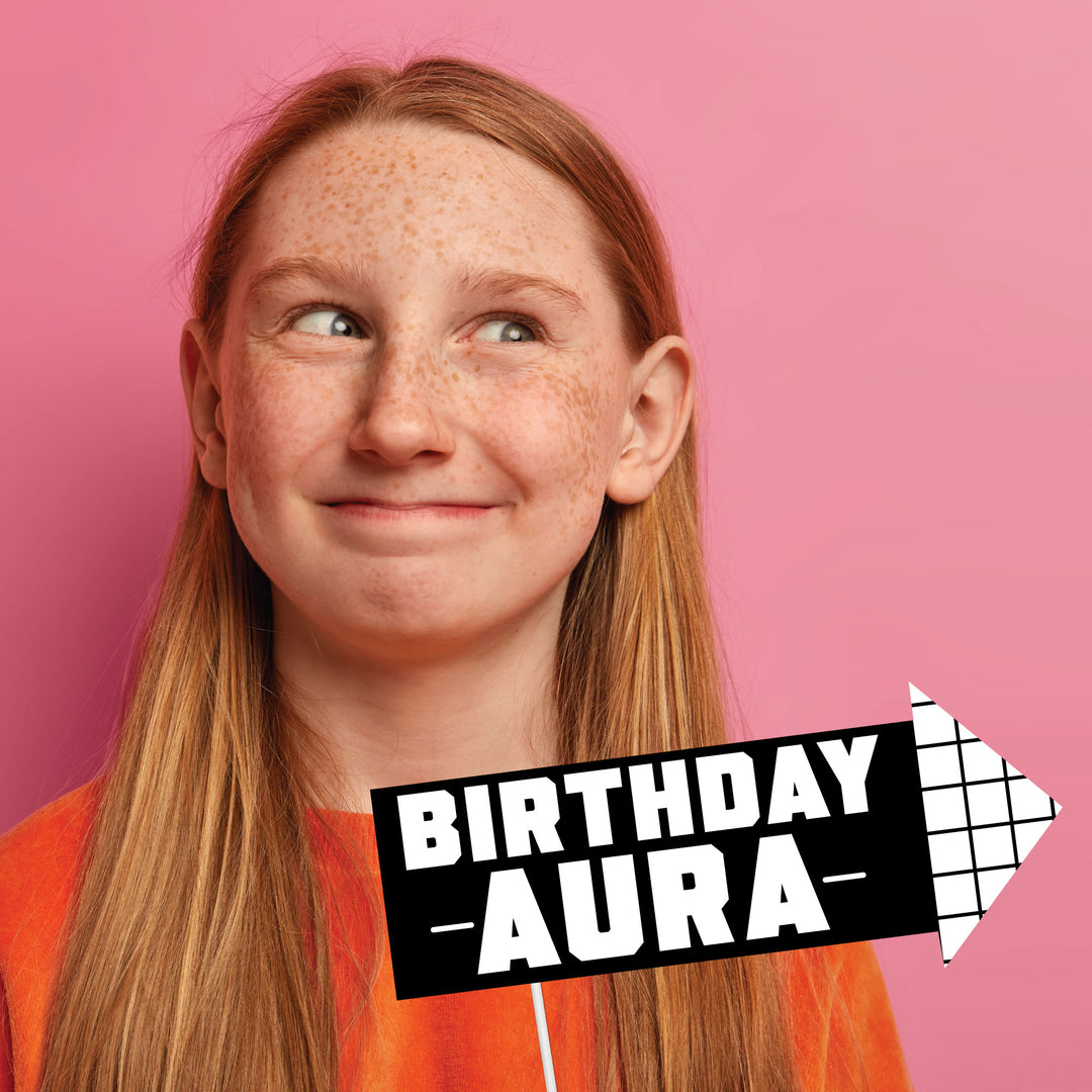 kids using photo props at birthday party