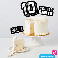cake topper styled on 10th birthday cake