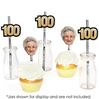 100th birthday drinks styled with personalized face straw decorations