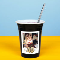 Black party cup with a custom photo of  '40' printed on it for a 40th Birthday party