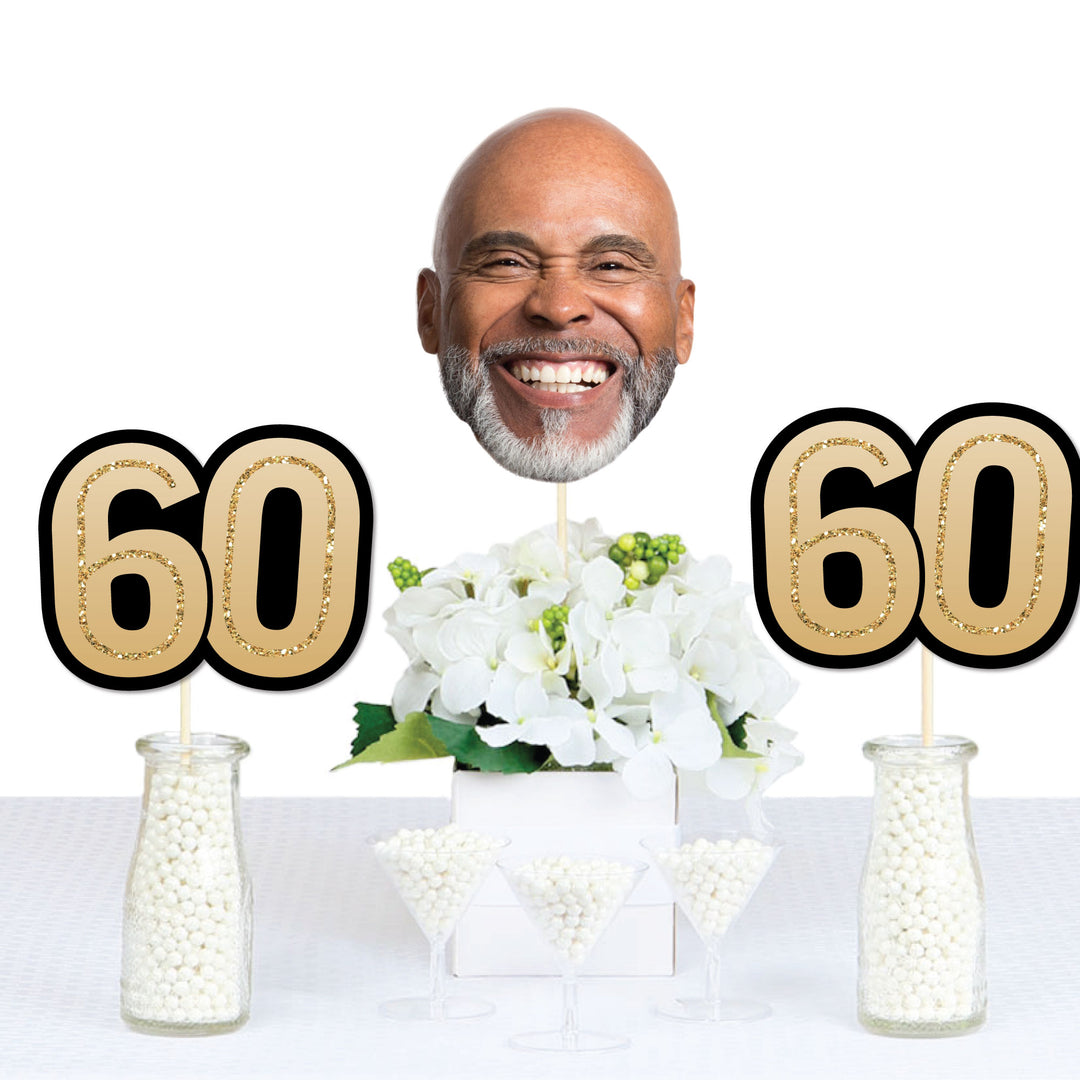 60th birthday party setup featuring custom face centerpieces