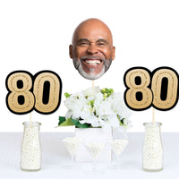 80th birthday party decor with personalized face table accents
