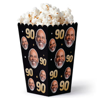 90th birthday celebration snack table with custom face popcorn boxes