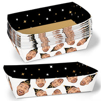 Two custom face black and gold paper food trays with a pattern of faces on a white background