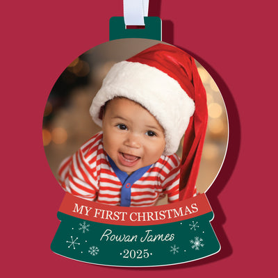 Personalized Christmas ornament with a baby in a Santa hat on a red background