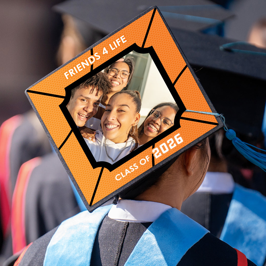 Graduation ceremony cap with basketball themed topper