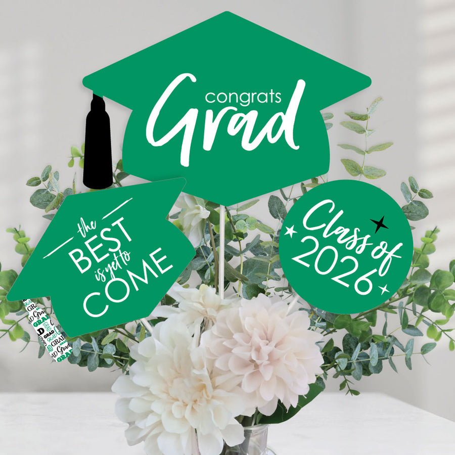 Graduation-themed decorations with 'Congrats Grad' and 'Class of 2026' text on a floral background.