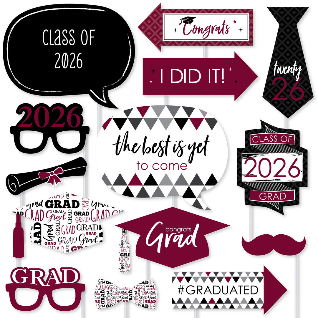 Graduation-themed photo booth props with text and graphics for Class of 2026.