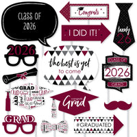 Graduation-themed photo booth props with text and graphics for Class of 2026.