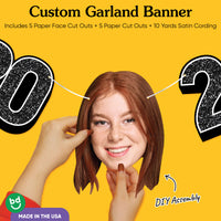 Cardstock construction and satin string on 20th birthday banner