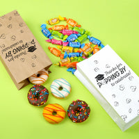 Black and white graduation cap treat bag close-up