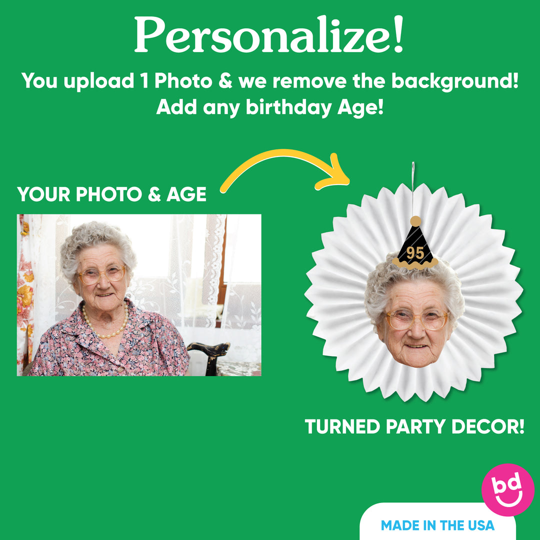 Close-up of custom face cutout with black and gold birthday hat