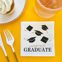 24-count Black and Gold graduation napkins display