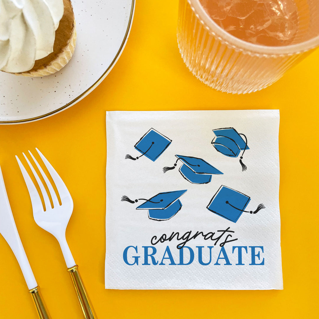 24-count Blue graduation napkins stacked
