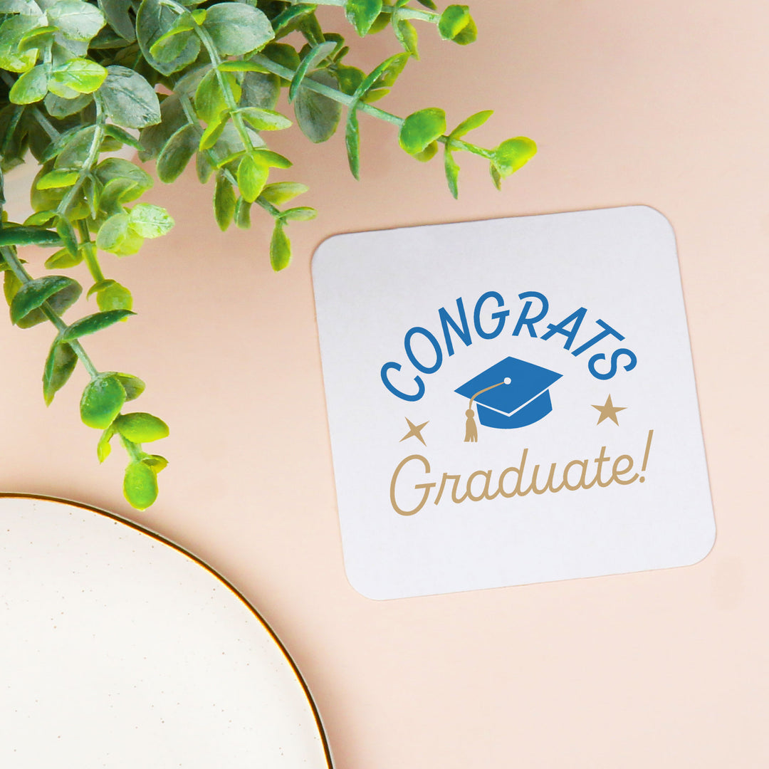 Blue graduation cap coaster close-up