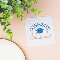 Blue graduation cap coaster close-up