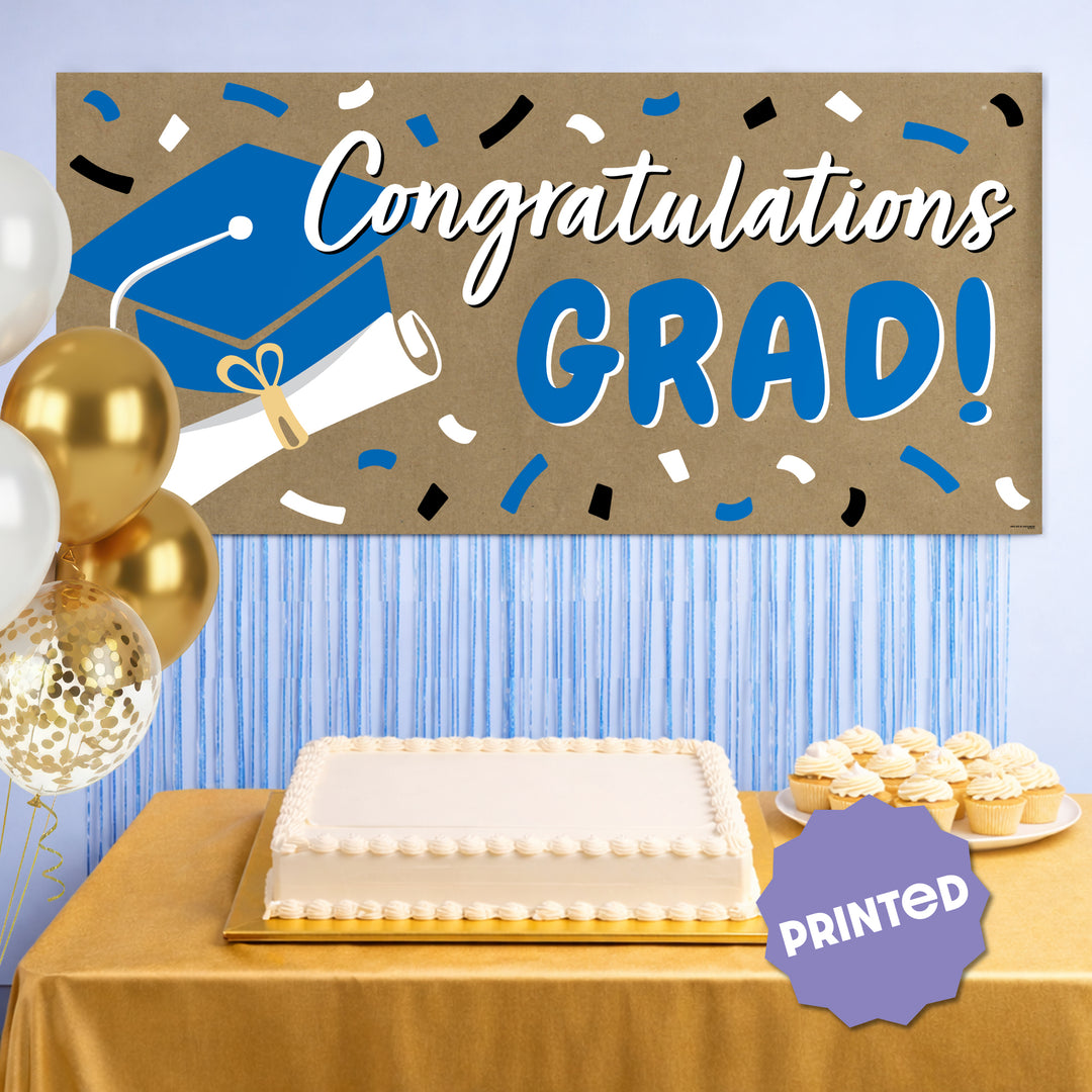 Blue graduation banner used as party backdrop