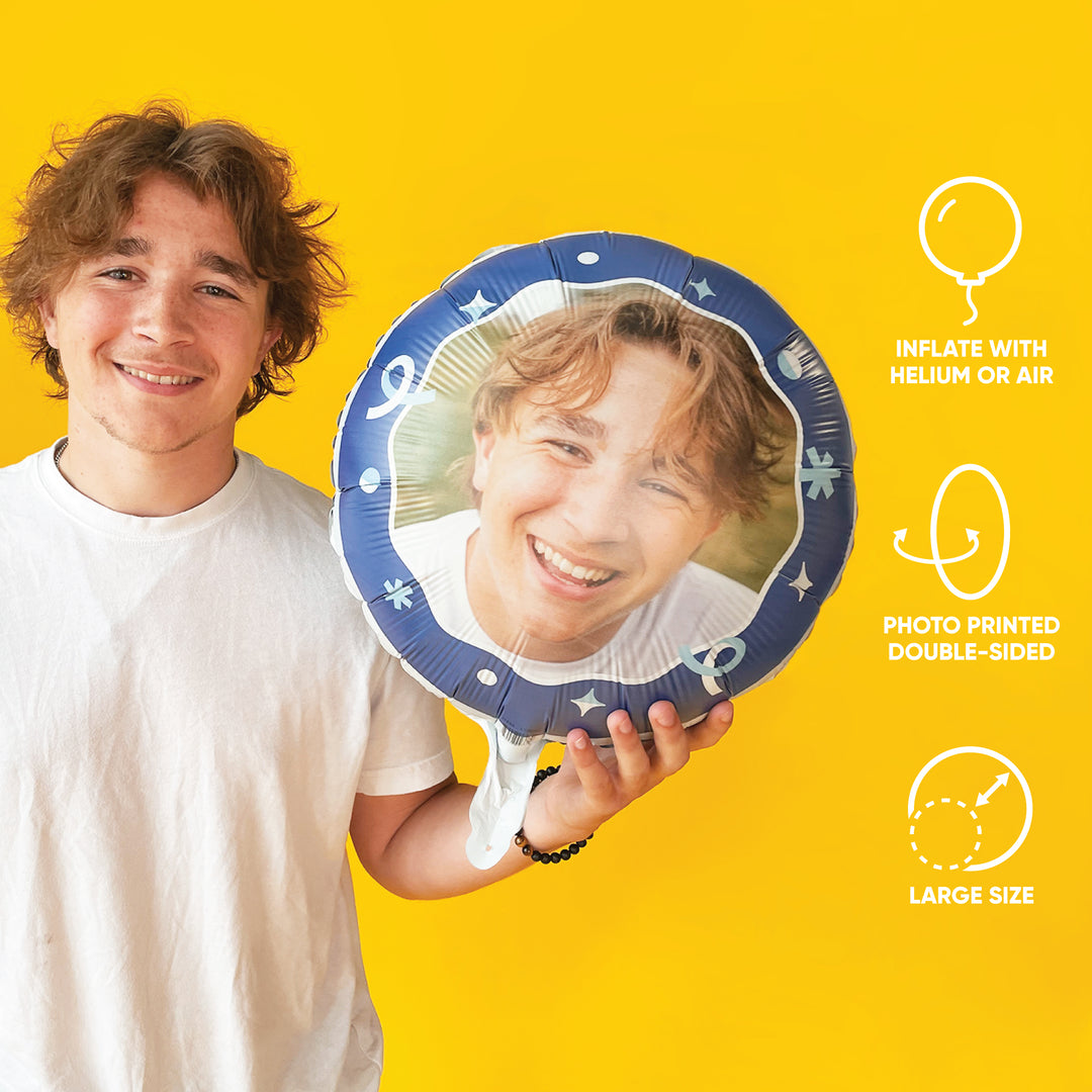 Boy holding a custom mylar balloons with his photo printed on each side