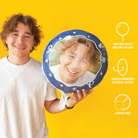 Boy holding a custom mylar balloons with his photo printed on each side
