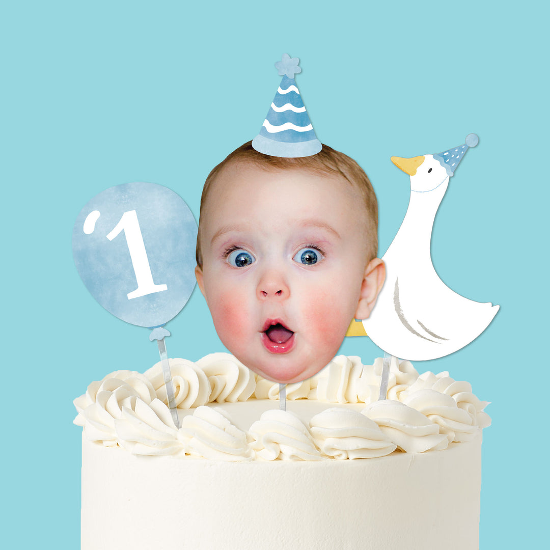 One Silly Goose blue cake topper with photo face balloon and goose