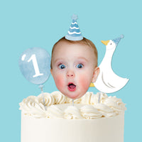 One Silly Goose blue cake topper with photo face balloon and goose