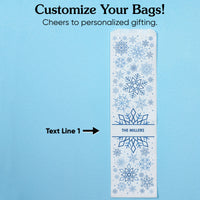 Personalized gift bag with snowflake design and customizable text on a blue background