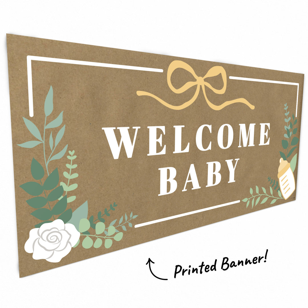 Close-up of greenery and floral details on baby banner