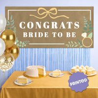 Botanical bride banner styled above mimosa bar at bridal brunch