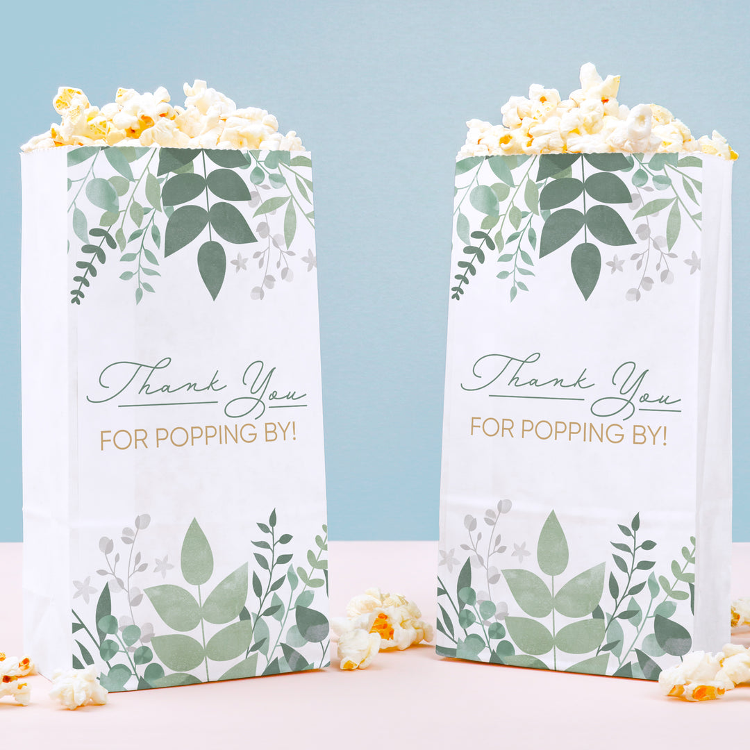 Two popcorn boxes with leaf patterns and 'Thank You For Popping By!' text on a light blue background.