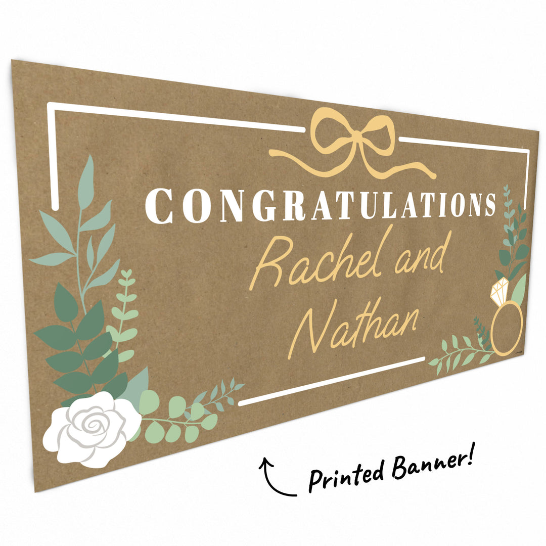 Greenery, bow and ring illustration close-up on kraft banner
