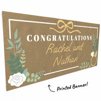 Greenery, bow and ring illustration close-up on kraft banner
