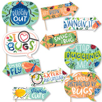 A set of colorful photo booth props with various playful captions related to bugs, designed for a children's birthday party.