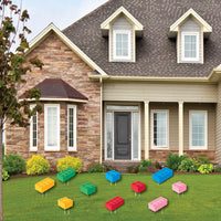 Colorful toy building blocks lawn decoration for part on a lawn in front of a house
