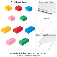 Yard decorations with colorful blocks and text about stakes and assembly.