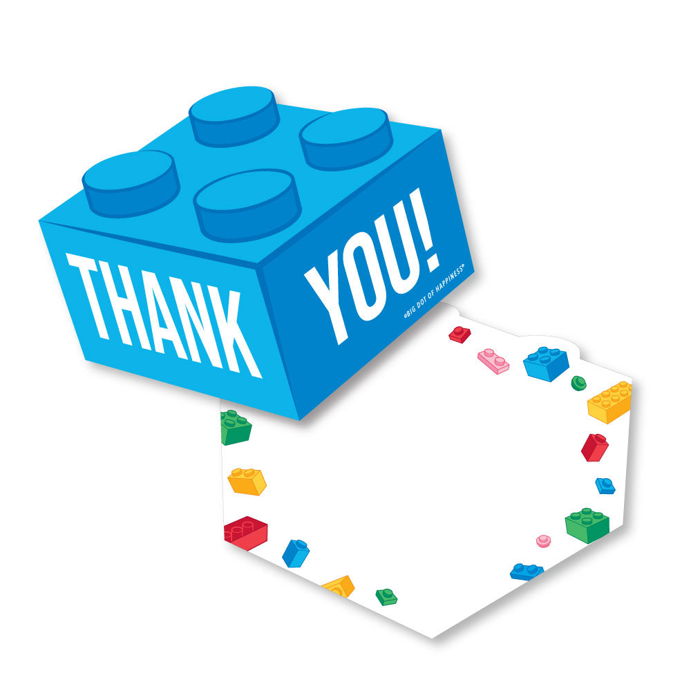Blue building block-shaped card with 'THANK YOU!' text and colorful small blocks on a white background