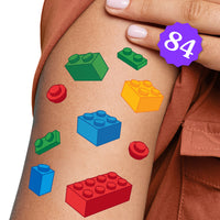 84 Count Colorful temporary tattoos of building blocks on a person's arm 