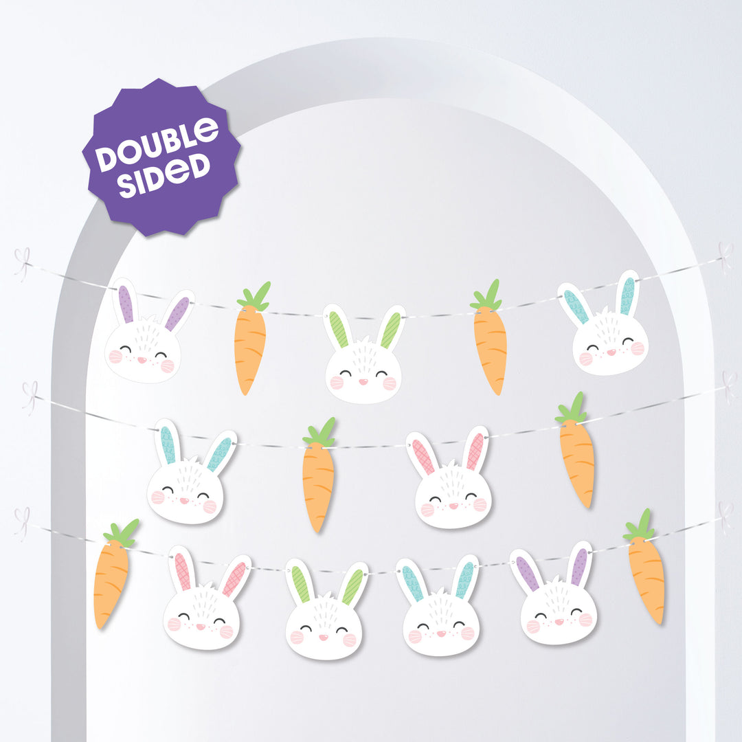 Decorative banner with cartoon bunnies and carrots on a white background