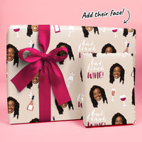 Wine Themed Gift box with a pink ribbon and personalized face feature on a pink background
