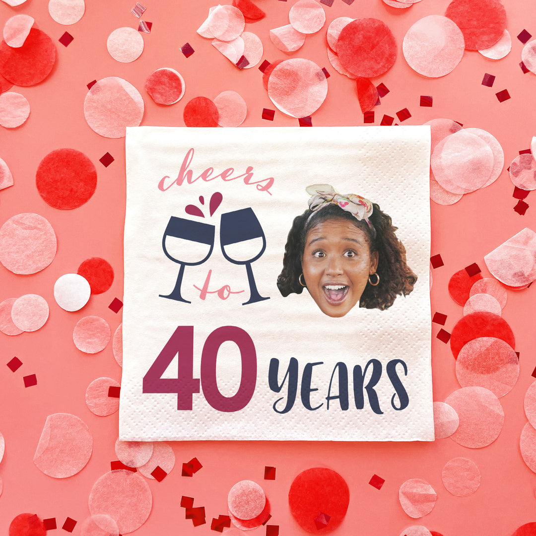 Personalized Napkin with 'Cheers to 40 Years' text on a pink background with confetti