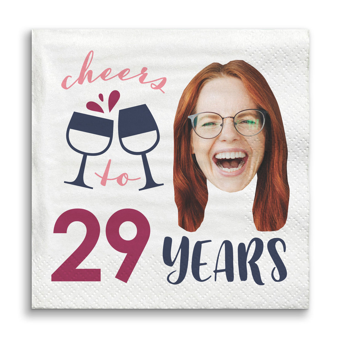Custom Photo Napkin with a photo of a person and text 'cheers to 29 years' on a white background