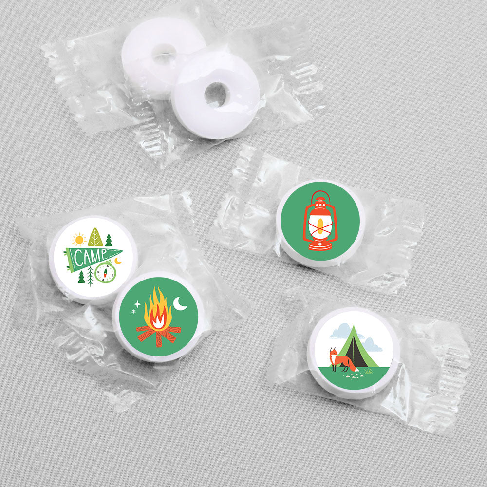 Close-up of camping stickers with lantern and campfire icons