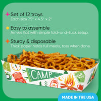 Camping birthday party food table with filled trays