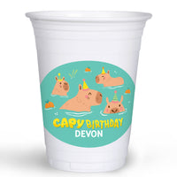 White cup with a colorful capybara design and custom text on a white background