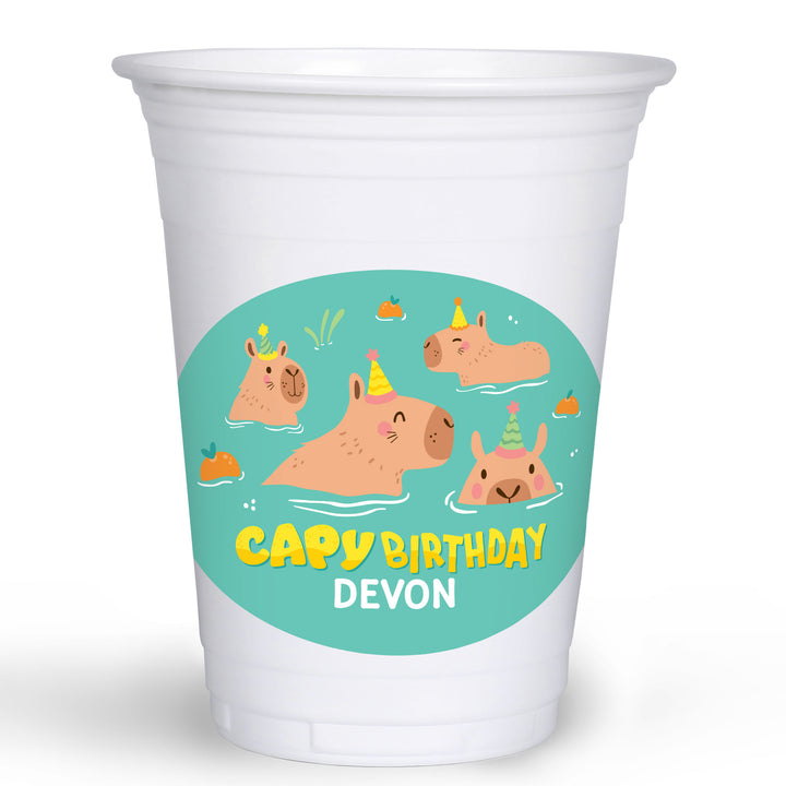White cup with a colorful capybara design and custom text on a white background