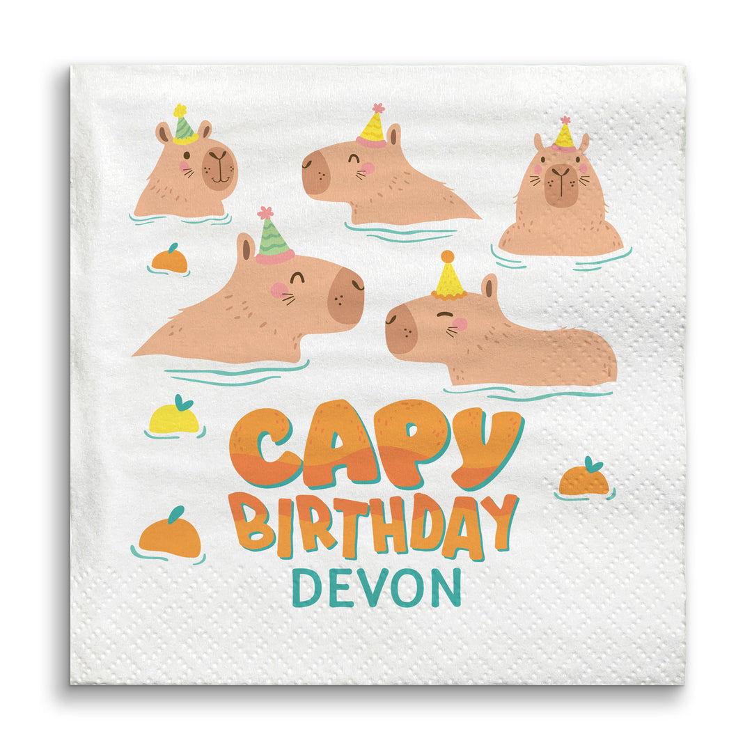 Capybara-themed birthday napkin with 'Capy Birthday Devon' text on a white background