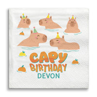 Capybara-themed birthday napkin with 'Capy Birthday Devon' text on a white background