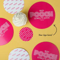 Custom your logo here table confetti styled on a yellow table with a pink design