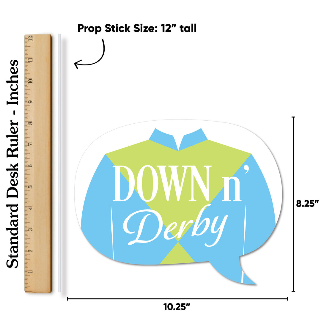 Decorative prop with 'Down n' Derby' text next to a ruler for size reference.